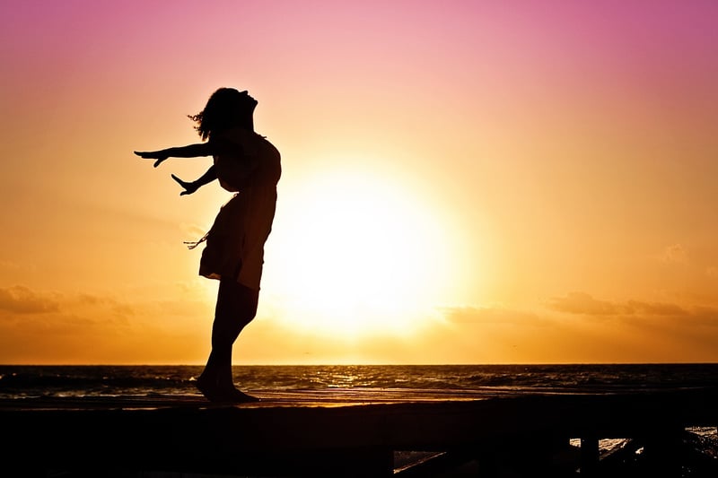 Woman prioritizing herself at sunrise